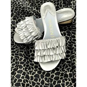 Slip-on Flat, Silver size 6.5.  New with box.